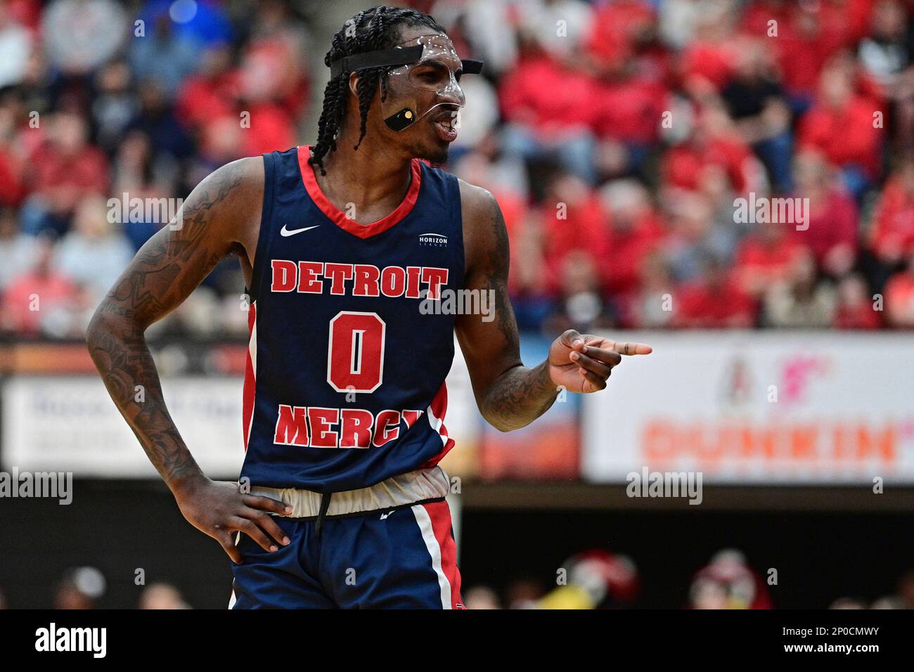 Detroit Mercy guard Antoine Davis smiles while talking with fans during