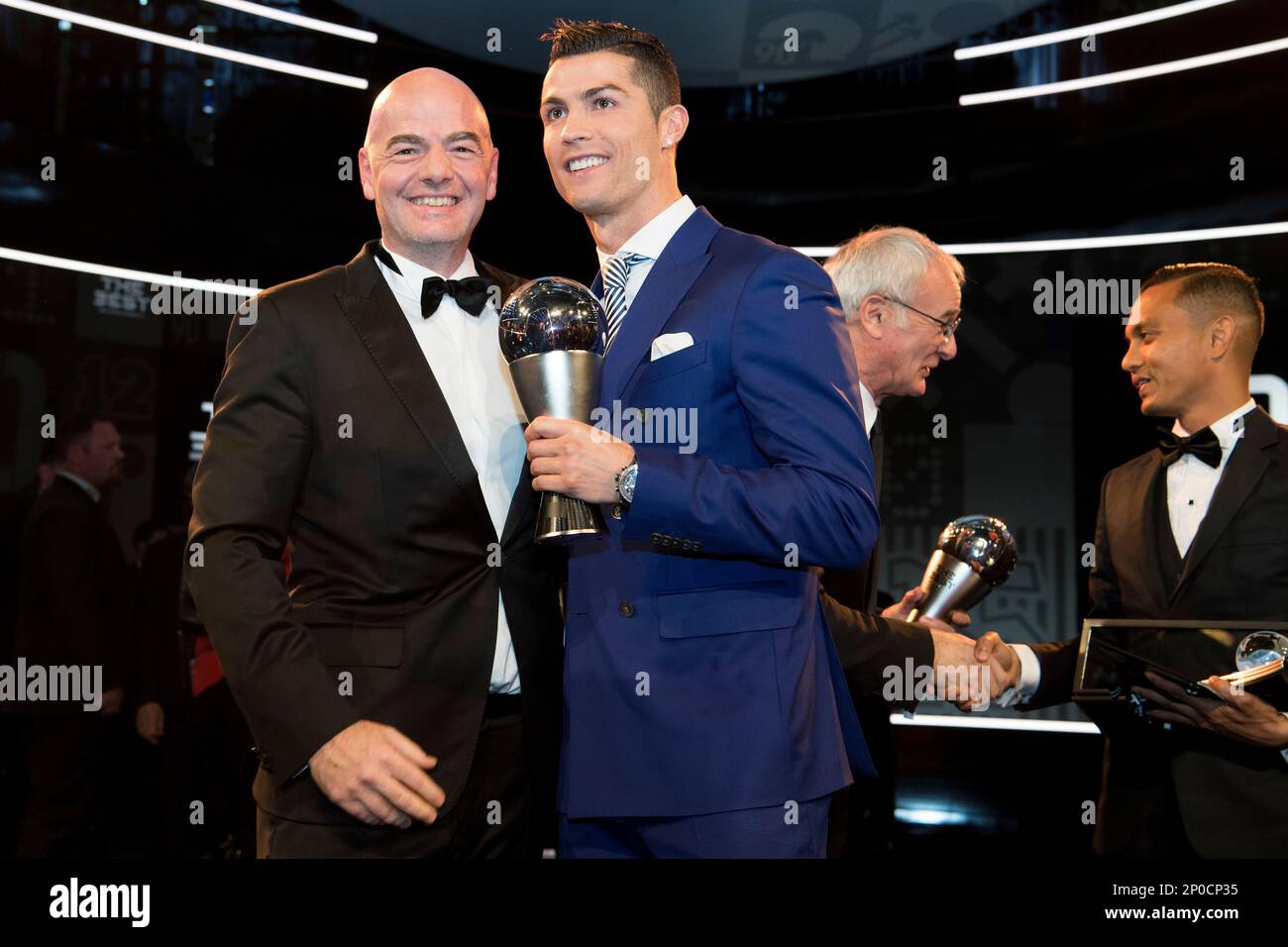 Portugal's Cristiano Ronaldo, right, poses with FIFA President Gianni