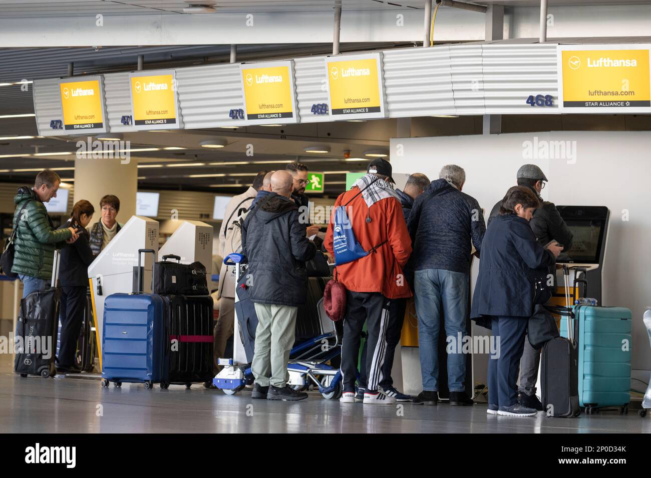 28 February 2023, Hesse, Frankfurt/Main Passengers stand at the