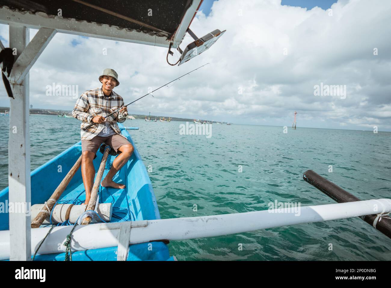 Smiling Angler with Thumbs Up while Holding a Fishing Rod Stock Photo -  Image of angling, boat: 270911050