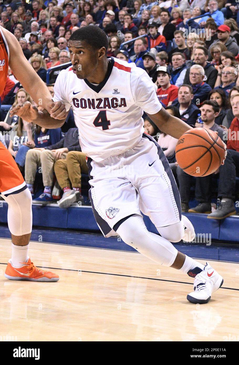 SPOKANE WA DECEMBER 29 Gonzaga senior guard Jordan Mathews 4 drives during the game between the Pepperdine University Waves and the Gonzaga University Bulldogs on December 29 2016 at the McCarthey