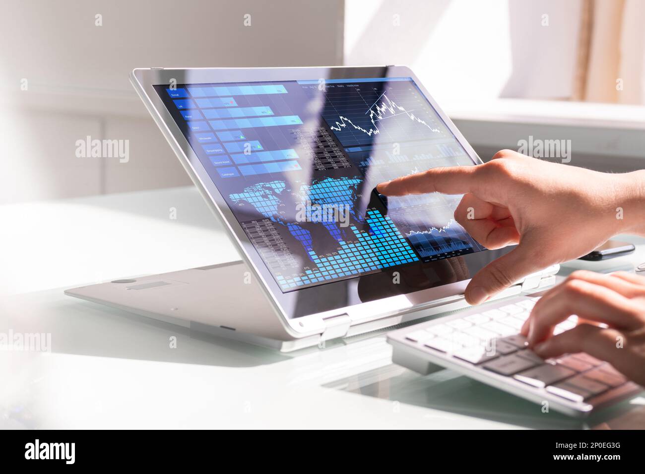Financial Data Analyst Female Using KPI Dashboard On Laptop Stock Photo