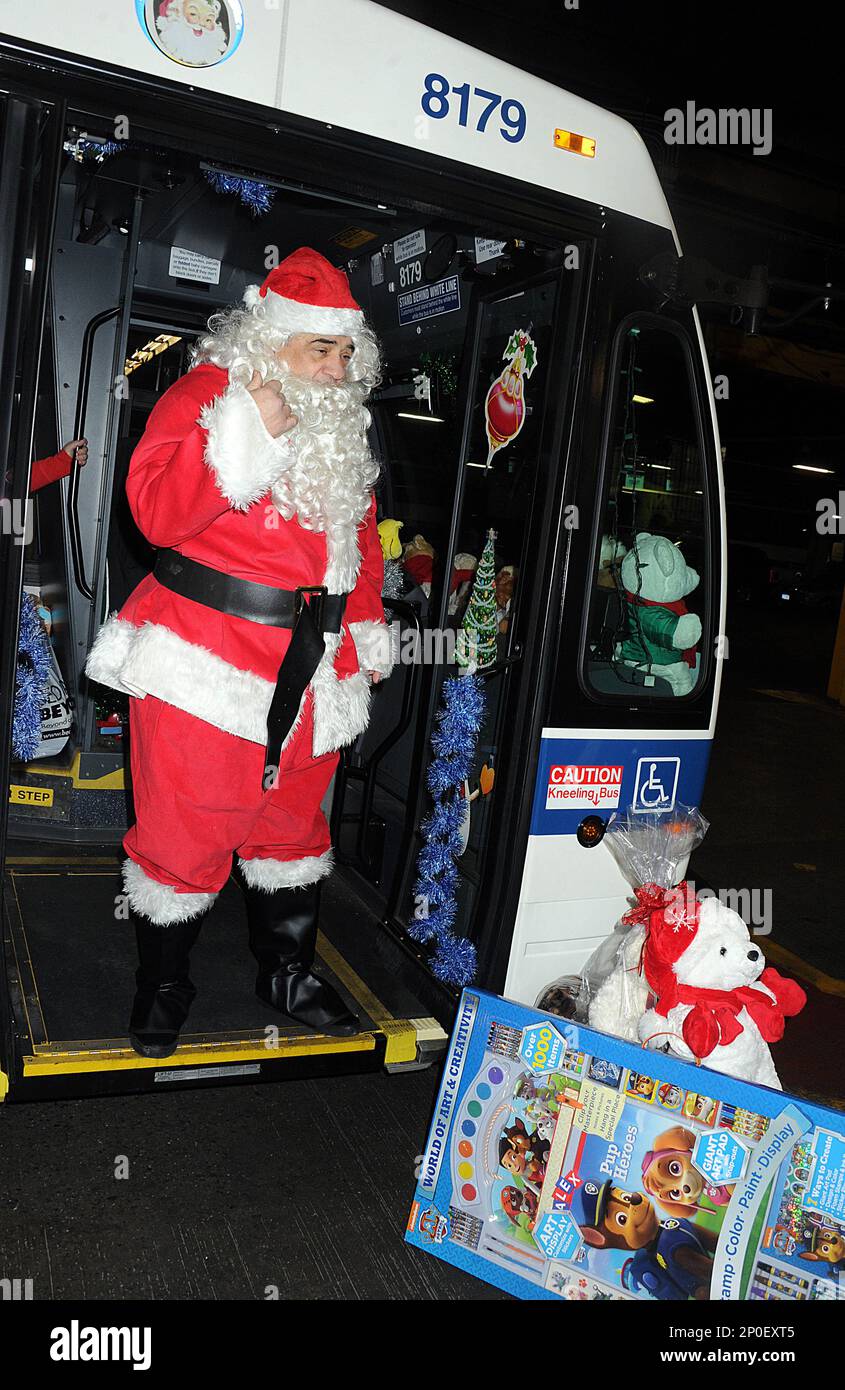 Photo by Dennis Van Tine STAR MAX IPx12 21 16Kids Against Cancer holds toy drive Kids Against Cancer holds toy drive with a MTA bus decorated as Santa s Express departing from Staten Island Bus Depot