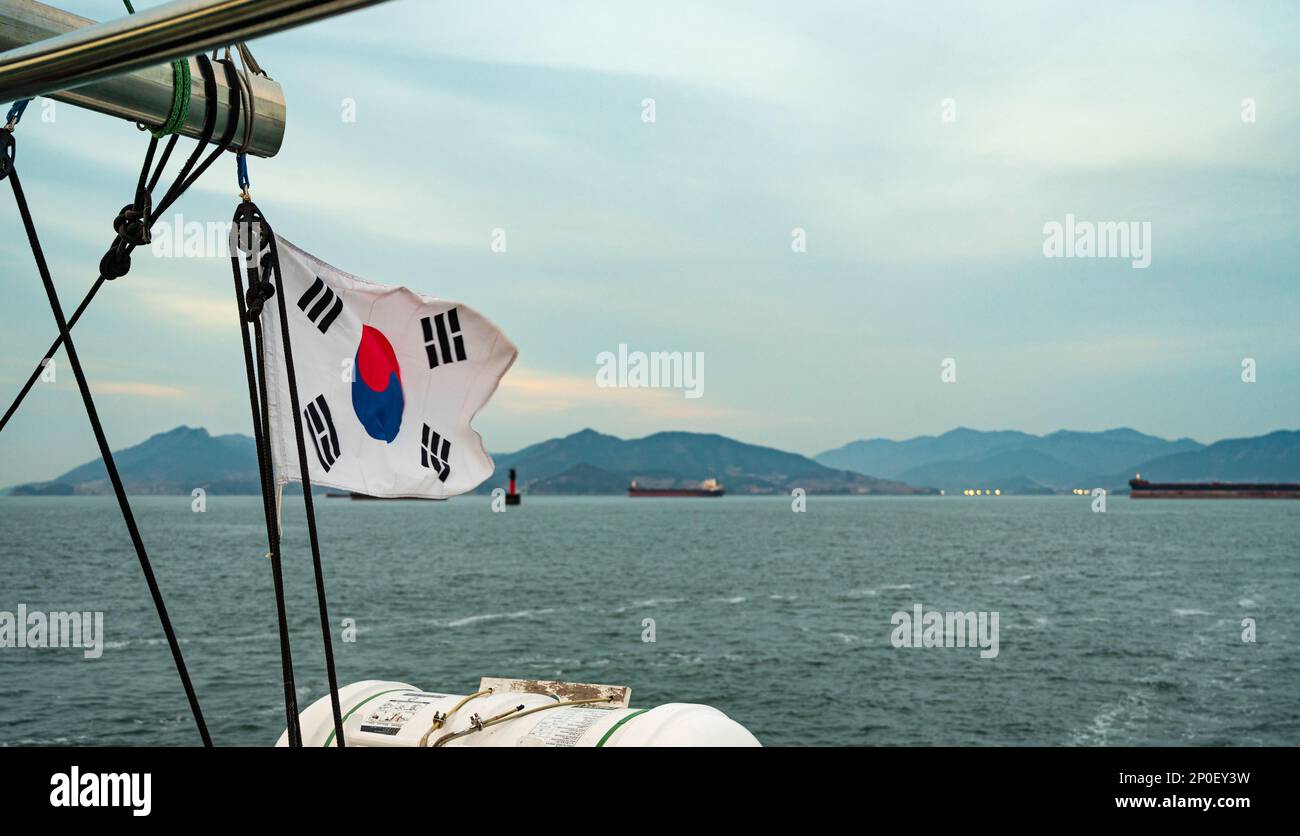 The Korean flag of the cruise ship swaying in the wind. Stock Photo