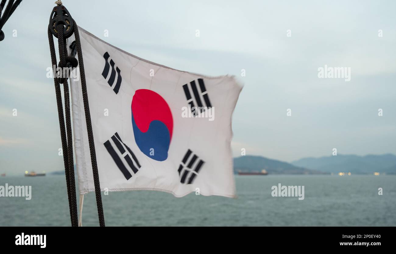 The Korean flag of the cruise ship swaying in the wind. Stock Photo