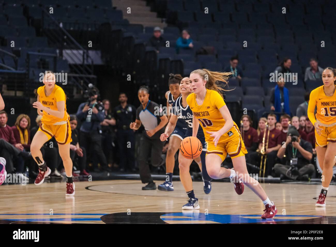 Minneapolis, Minnesota, USA. 1st Mar, 2023. Minnesota Golden Gophers guard MARA BRAUN (10) brings the ball up court with Penn State Nittany Lions guard LEILANI KAPINUS (5) reacting to the play during the first half of Penn St. against Minnesota on Wednesday March 1st at the 2023 Big Ten Women's Basketball Tournament in Minneapolis, Minnesota. Penn State won with a score of 72-67. (Credit Image: © Steven Garcia/ZUMA Press Wire) EDITORIAL USAGE ONLY! Not for Commercial USAGE! Stock Photo