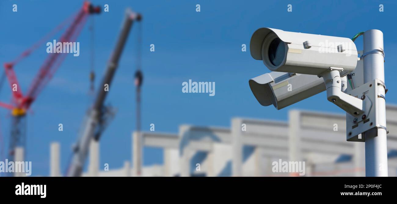 Construction site monitoring by video cameras Stock Photo