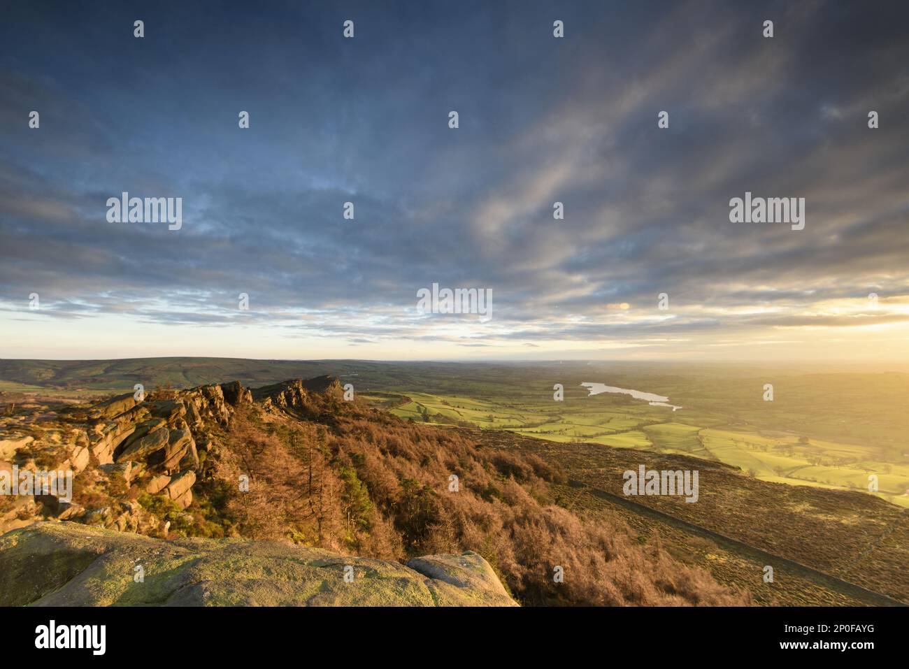 View of the Gritstone escarpment in the afternoon sun, Roaches Upper Tier, The Roaches, North Staffordshire Moorlands, Peak District National Park Stock Photo