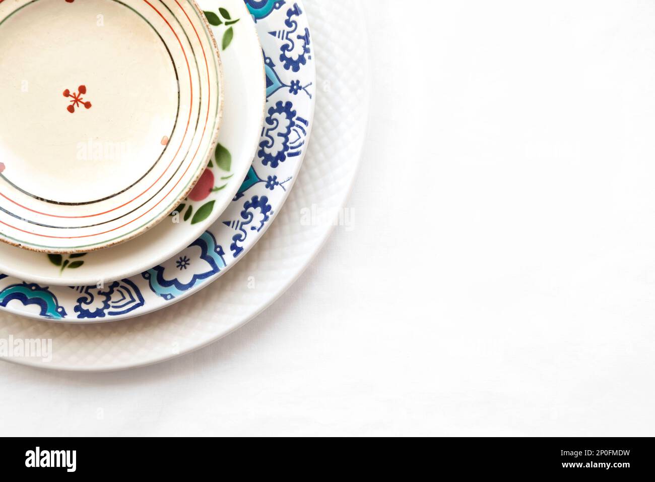 Stack Of Styrofoam Plates Beside Ceramic Plate On Table High-Res Stock  Photo - Getty Images
