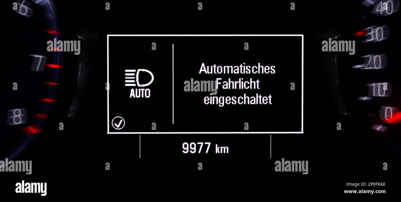 Automatic headlights switched on Stock Photo Alamy