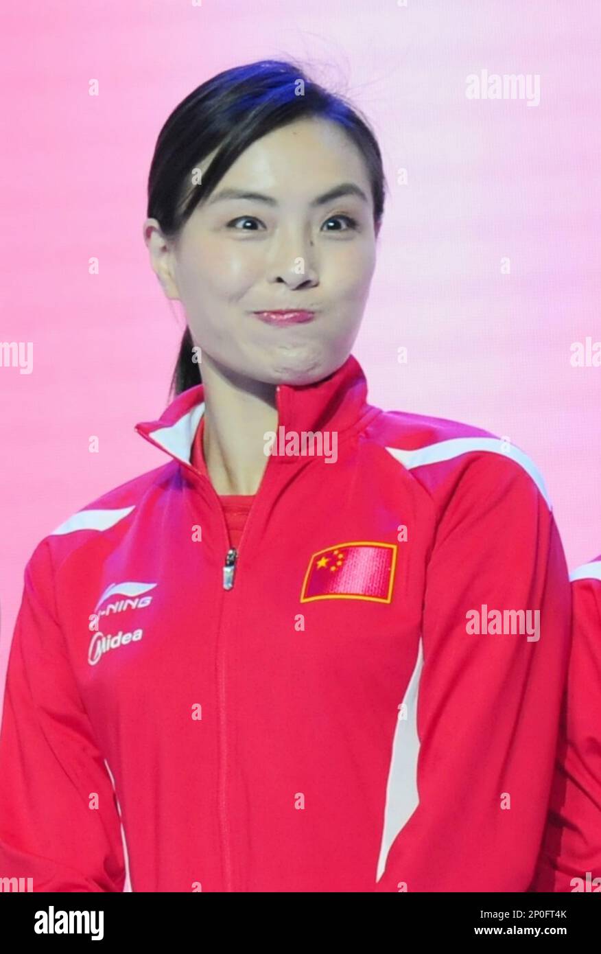 FILE--Chinese Olympic diving gold medalist Wu Minxia reacts during a dealer  conference of Chinese cosmetics brand Chando in Shanghai, China, 5  September 2016. After winning a record-tying five Olympic gold medals,  Chinas