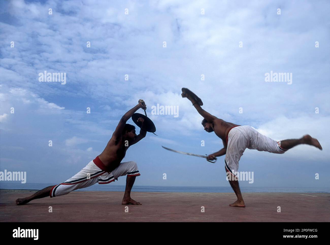 Kalaripayattu, Ancient martial art of kerala, India (Sword & Shield fight) Stock Photo