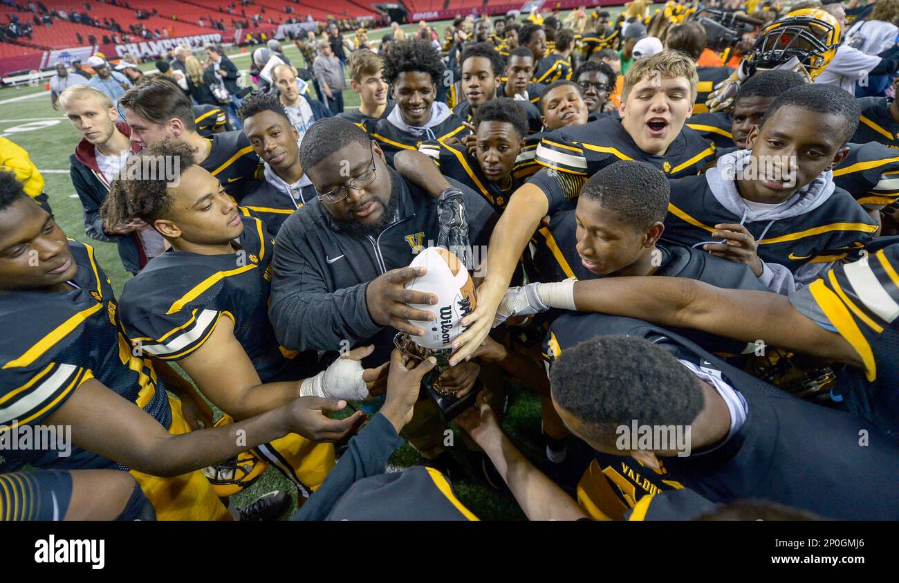 The Valdosta Wildcats celebrate their win over the Tucker Tigers in the