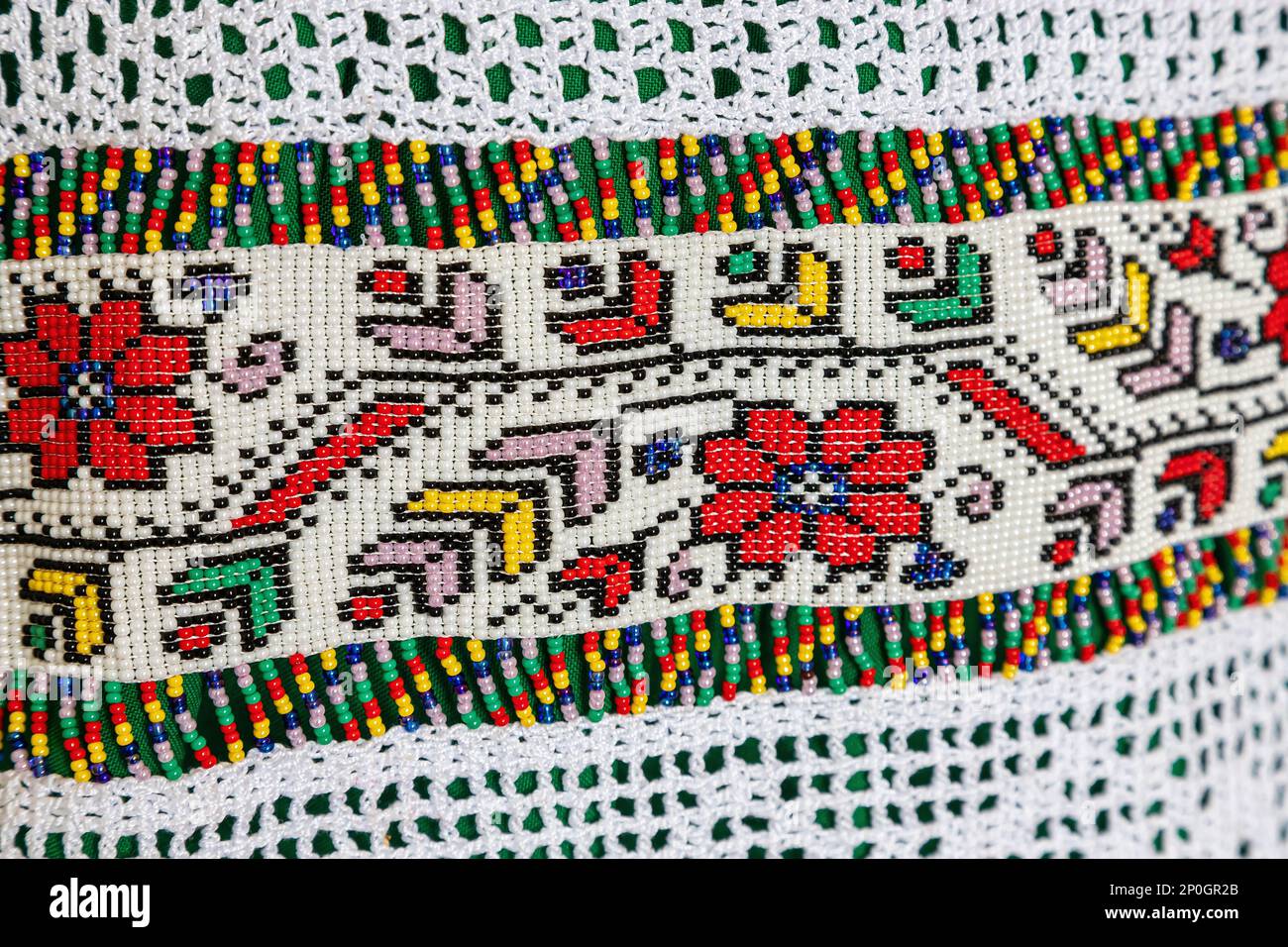 traditional clothes and beaded jewelry. traditional ornaments and patterns. handmade. Stock Photo