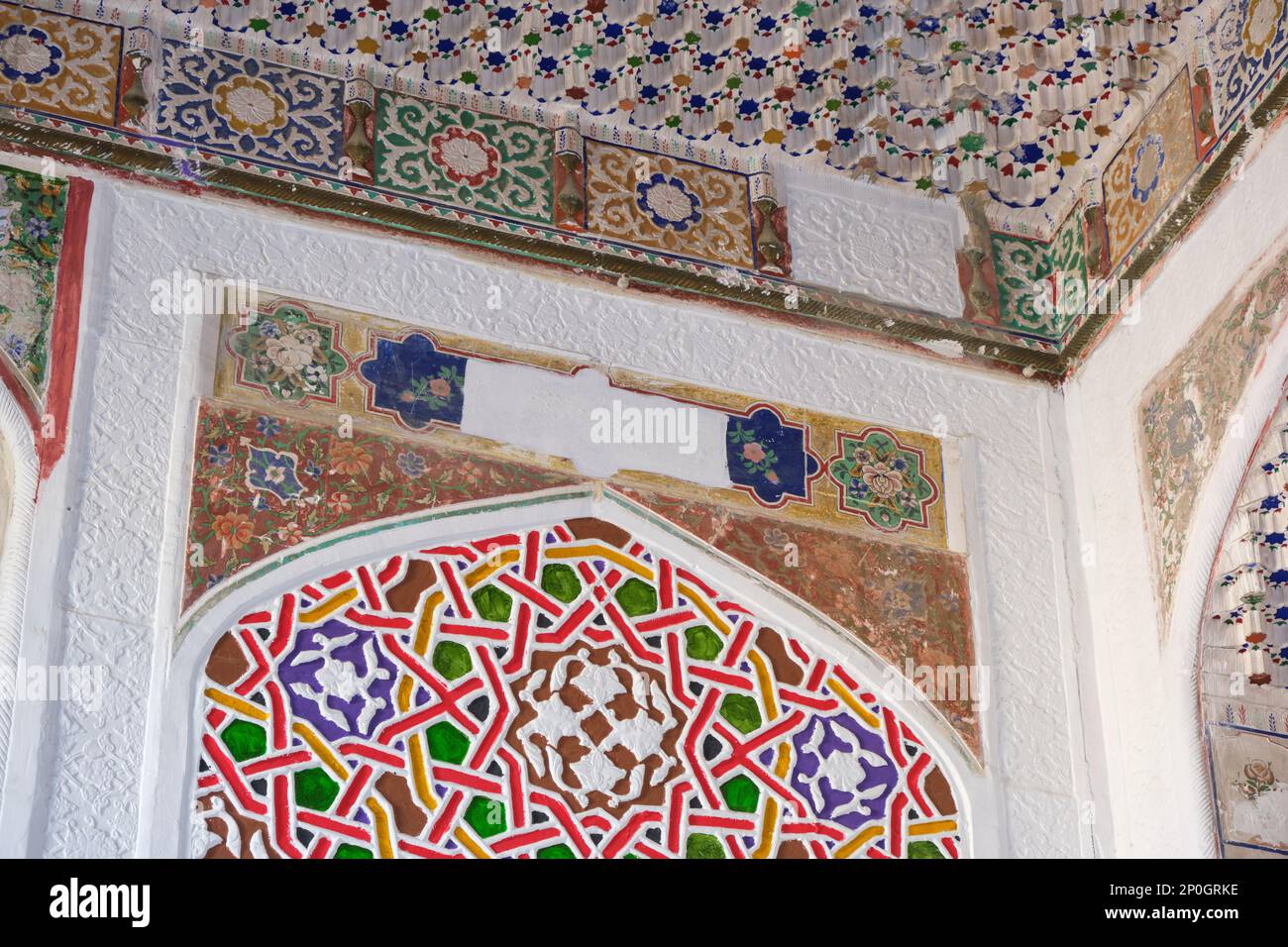 Detail of colorful, painted wall section at a renovated grand