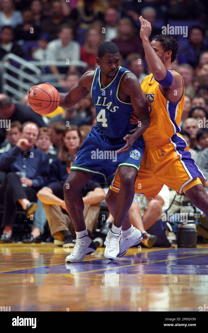 FILE: Michael Finley of the Dallas Mavericks with ball as Rick Fox