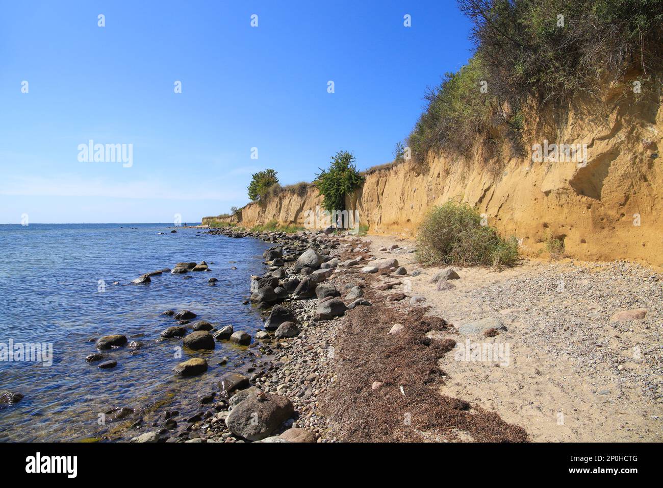 The shore along the steep coast of the holiday destination Klein Zicker at the island Rügen, Baltic Sea - Germany Stock Photo