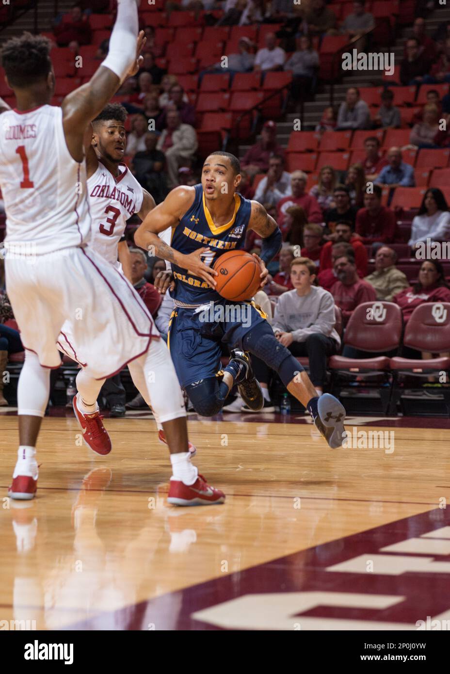 NORMAN, OK - NOVEMBER 29: Northern Colorado (0) Jordan Davis driving  towards the basket versus Oklahoma University on November 29, 2016, at the  Lloyd Noble Center in Norman, Oklahoma (Photo by Torrey