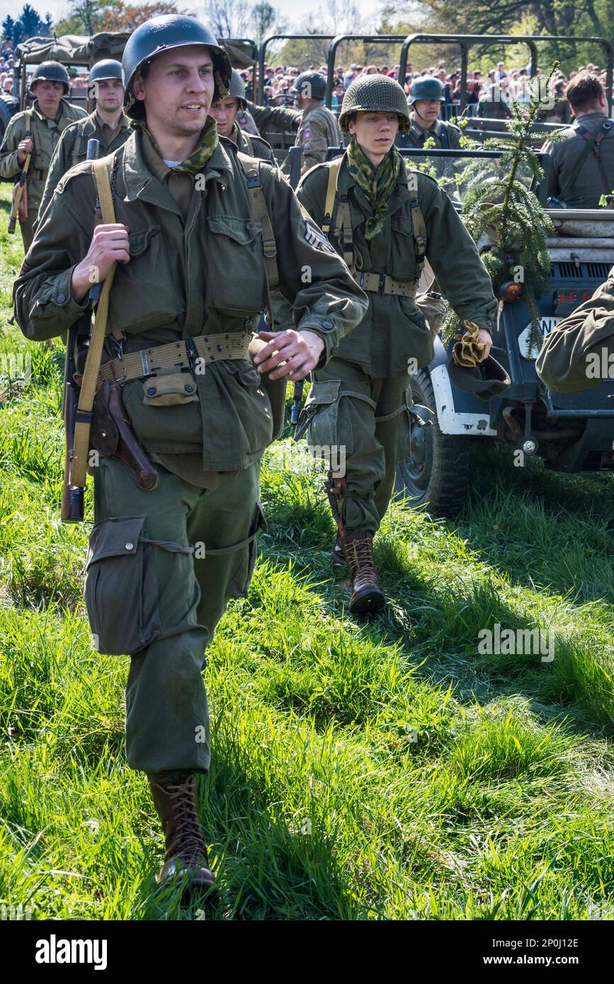 Reenactors in uniforms of US troops, at reenactment of WW2 battle, Jelenia Gora, Lower Silesia, Poland Stock Photo