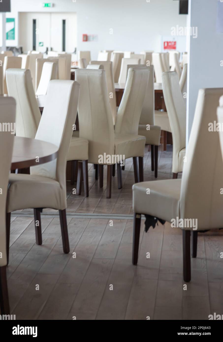 Abstract modern interior of cafe or meeting room with rounded armchairs. Stock Photo