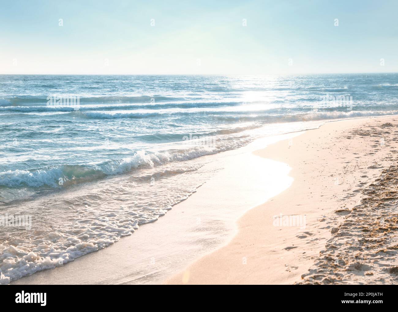 Blue waves rolling onto island hi-res stock photography and images - Alamy