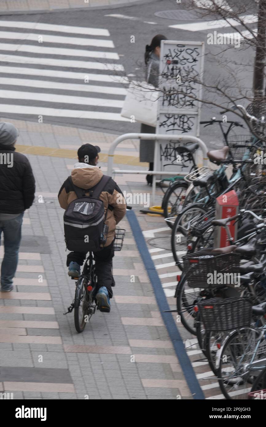 Japan woman on bike hires stock photography and images Alamy
