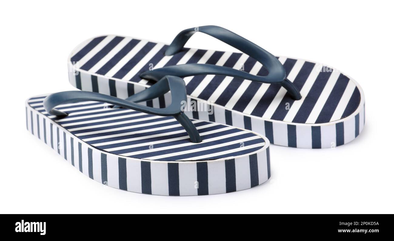 Pair of striped flip flops on white background Stock Photo - Alamy