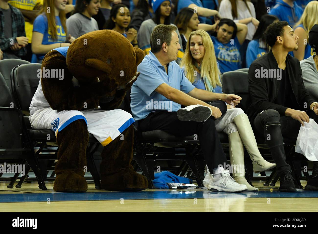 LOS ANGELES, CA - NOVEMBER 17: UCLA mascot Joe Bruin and a fan react to ...
