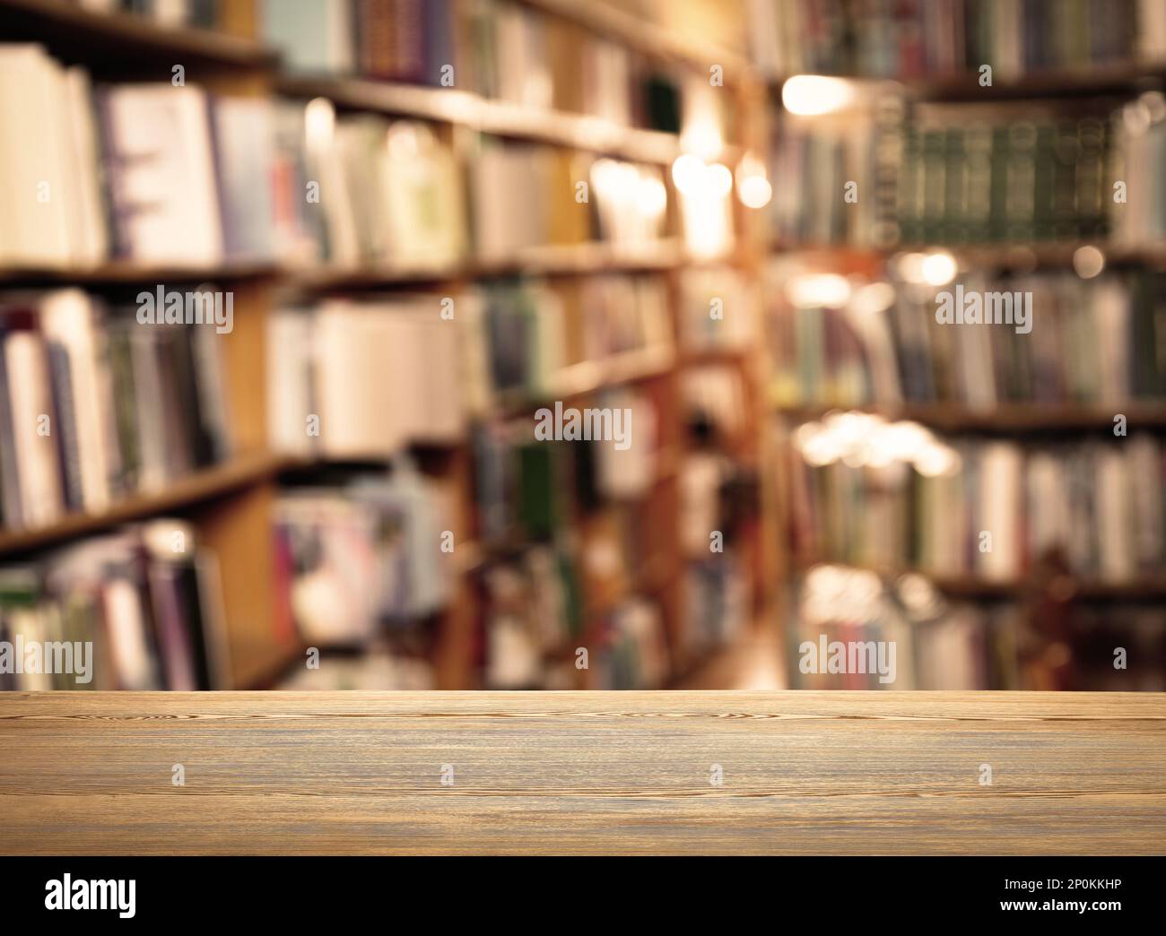 Empty wooden table in library. Space for design Stock Photo - Alamy