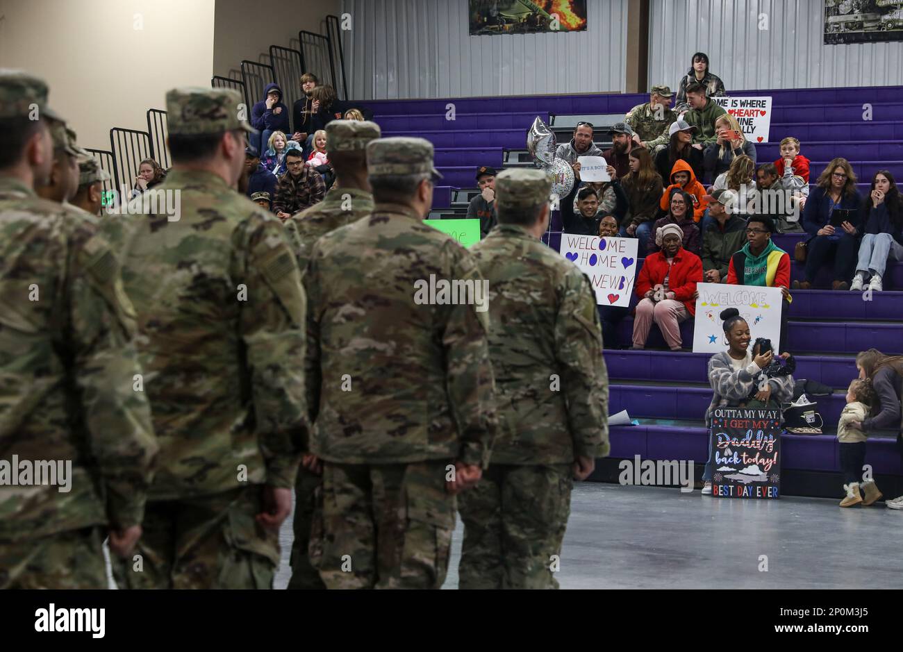 1st Infantry Division Soldiers face their Family and friends during a