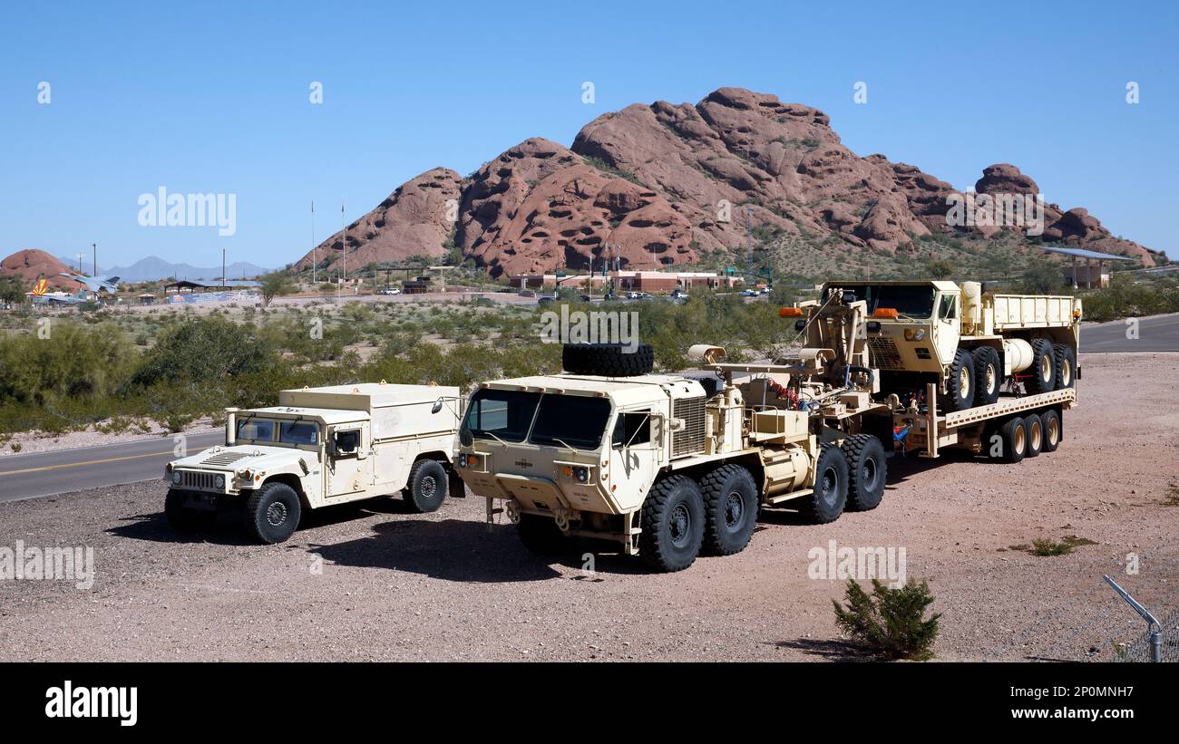 An Arizona Army National Guard Modular Catastrophic Recovery System (MCRS) is ready for offloading after being used to recover an inoperable M977 A4 Heavy Expanded Mobility Tactical Truck from Pinal Air Park in Marana, Feb. 5, 2023. The MCRS, which is made up of an M983A4 Light Equipment Transporter, a Fifth Wheel Towing and Recovery Device and a XM1150 Tilt Deck Recovery Trailor, can transport 35 tons. (Arizona Army National Guard photo by Sgt. 1st Class Brian A. Barbour) Stock Photo