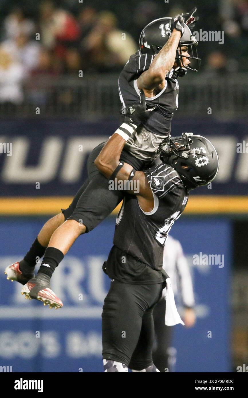 Northern Illinois cornerback Shawun Lurry (19) celebrates with safety