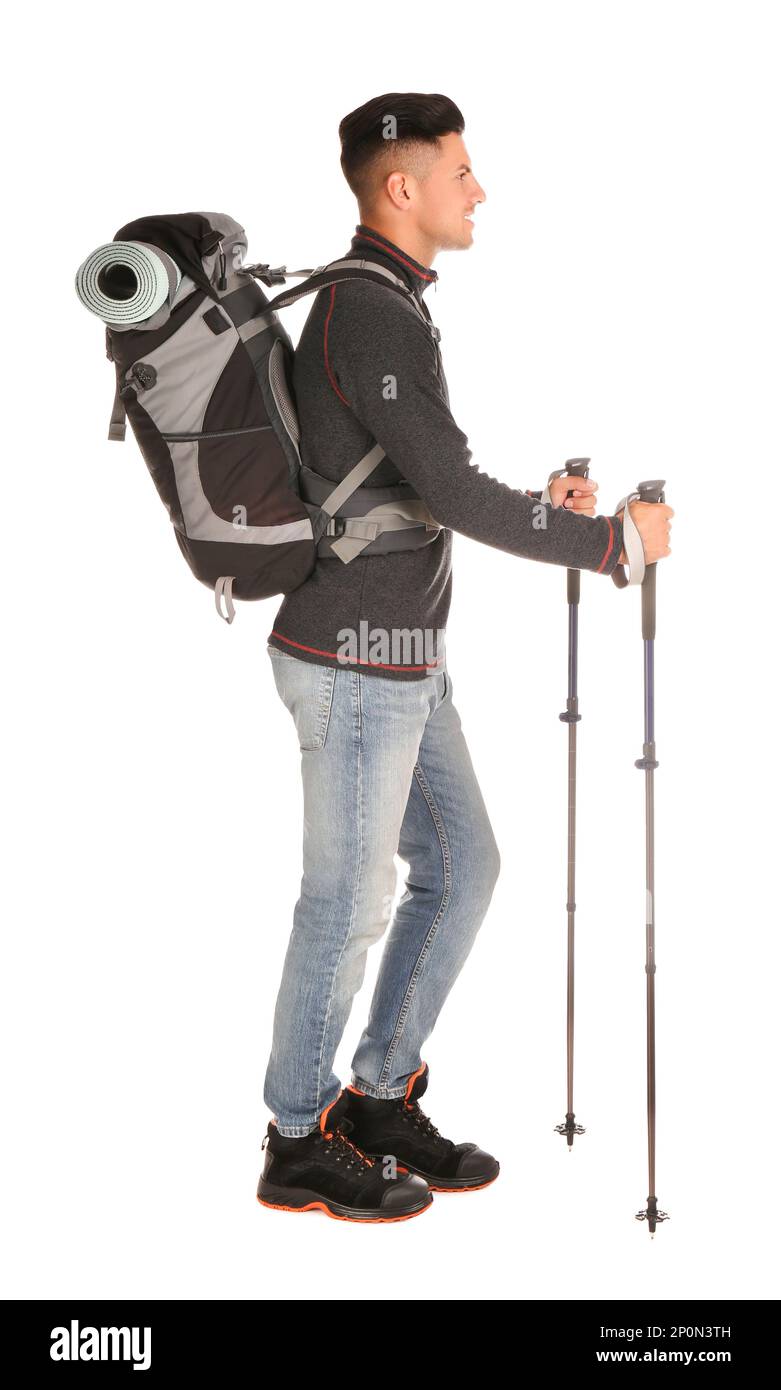 Male hiker with backpack and trekking poles on white background Stock ...