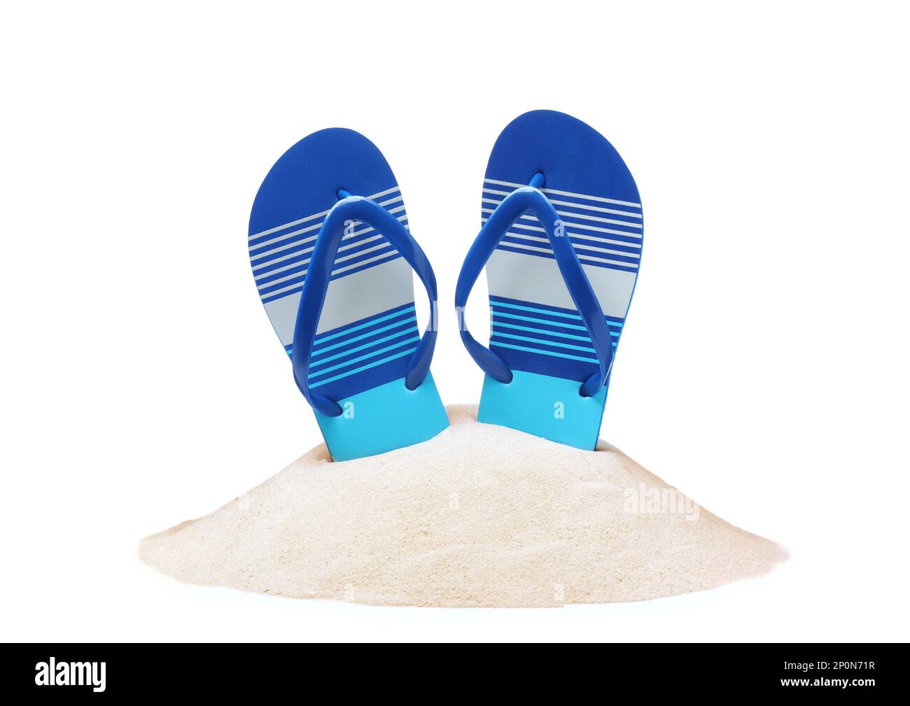 Striped flip flops in sand on white background Stock Photo - Alamy