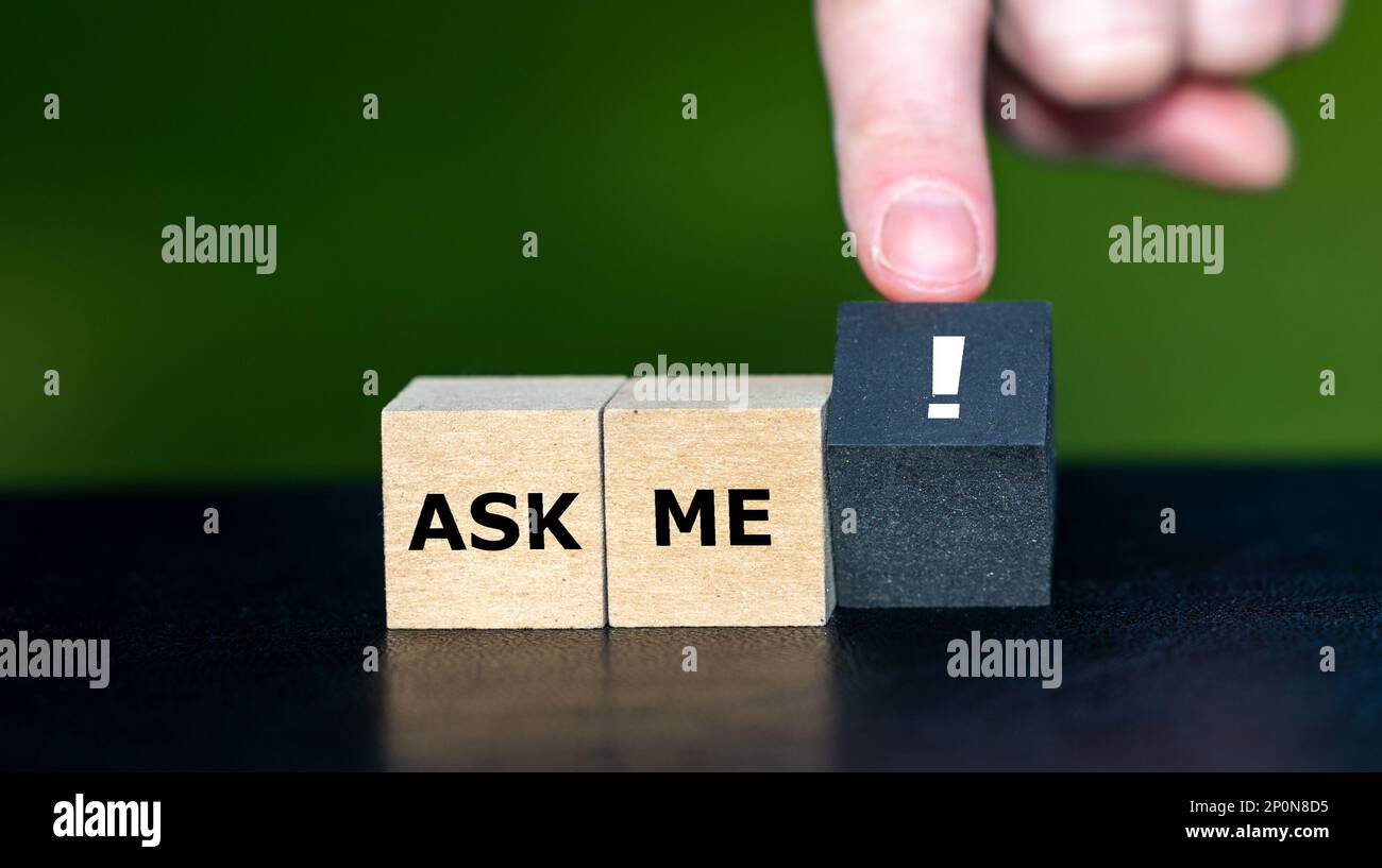 Wooden cubes form the expression 'ask me'. Stock Photo