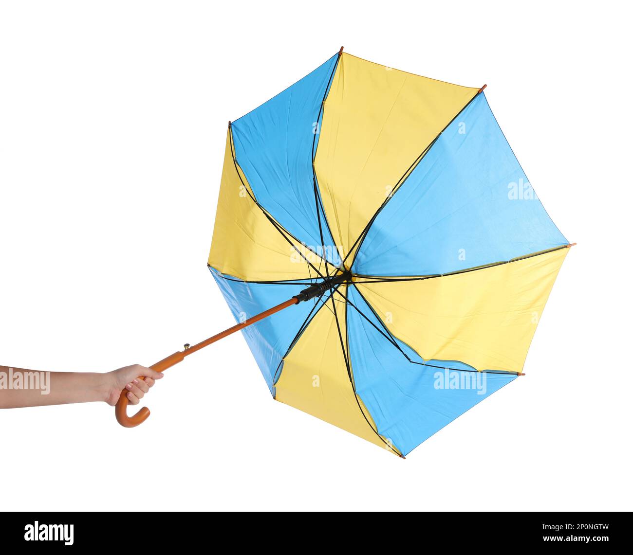 Woman with umbrella caught in gust of wind on white background, closeup Stock Photo