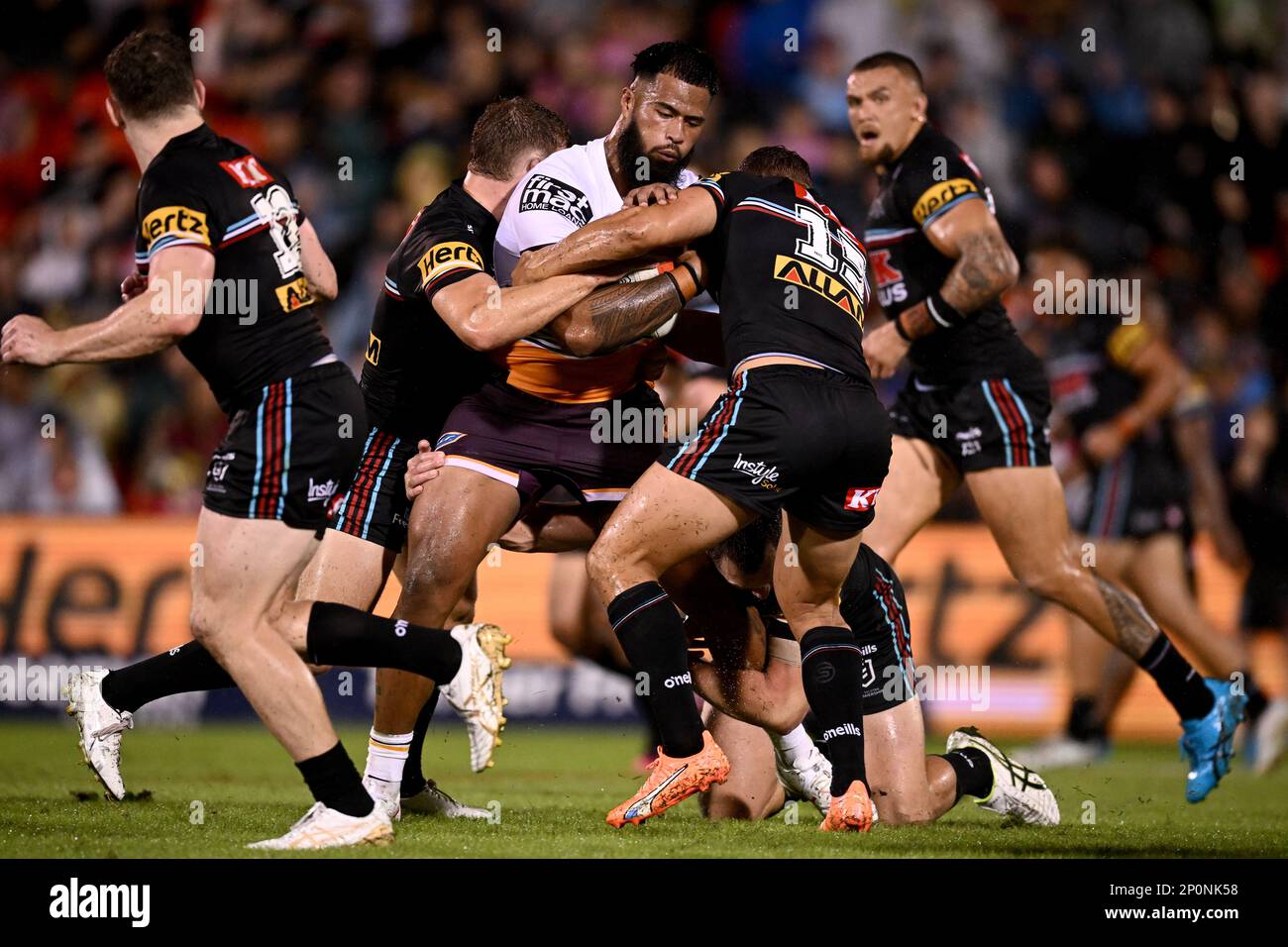 Scott Sorensen of the Panthers is tackled during the NRL Round 12 match  between the Brisbane Broncos and the Penrith Panthers at Suncorp Stadium in  Brisbane, Thursday, May 18, 2023. (AAP Image/Jono