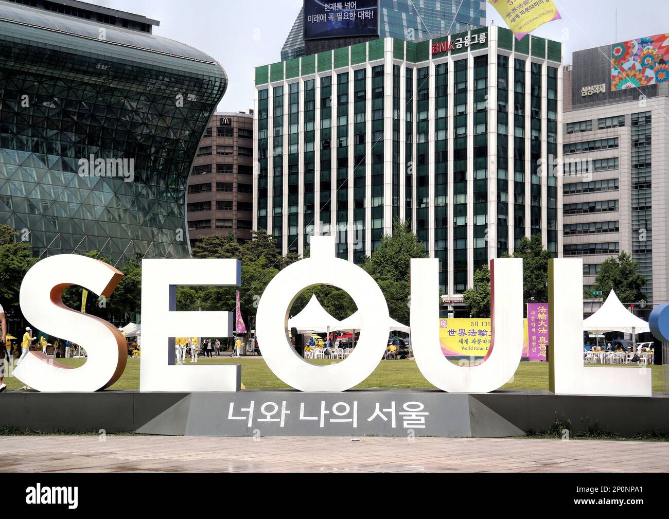 Seoul, South Korea - May 2019:  'I Seoul U' sign with cityscape in background at Seoul City Hall plaza Stock Photo