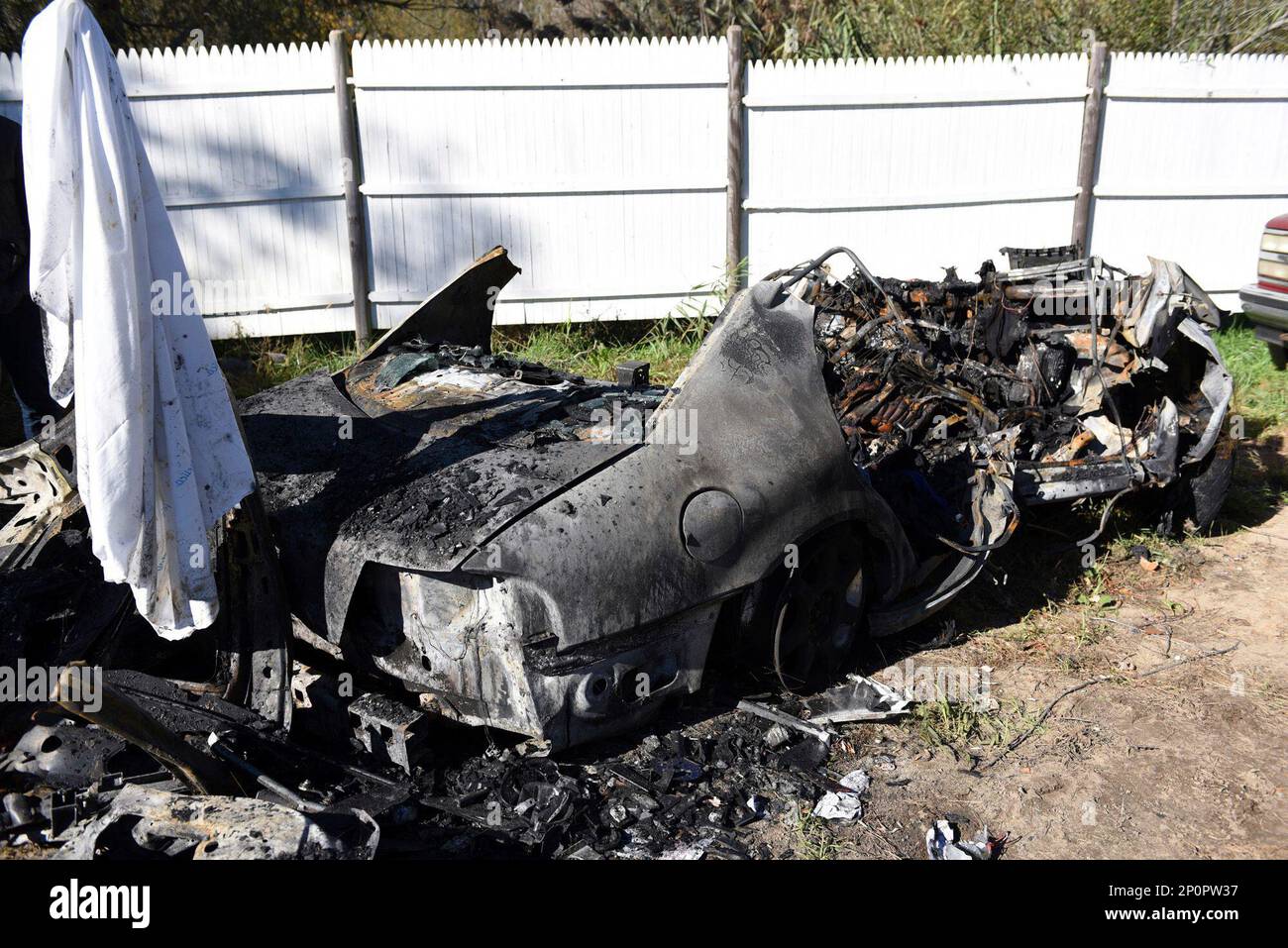 The remains of a car that carried four college students and was involved in a fiery crash as a