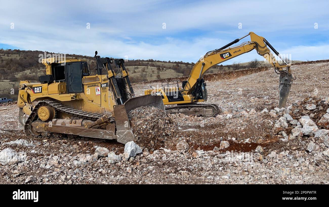 Excavator With Hydraulic Hammer And Bulldozer Working At Huge Mining