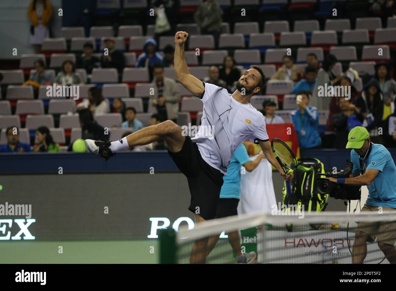 Viktor Troicki of Serbia celebrates after defeating Rafael Nadal of Spain in their mens singles second round match during the 2016 Shanghai Rolex Masters tennis tournament in Shanghai, China, 12 October 2016.Fourth