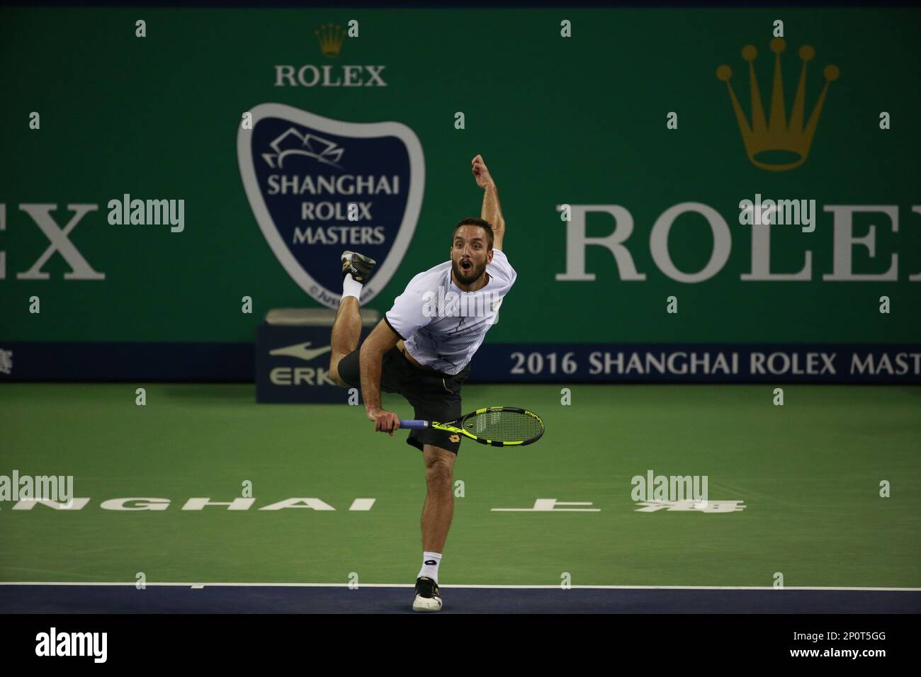 Viktor Troicki of Serbia serves against Rafael Nadal of Spain in their  men's singles second round match during the 2016 Shanghai Rolex Masters  tennis tournament in Shanghai, China, 12 October 2016.Fourth seed