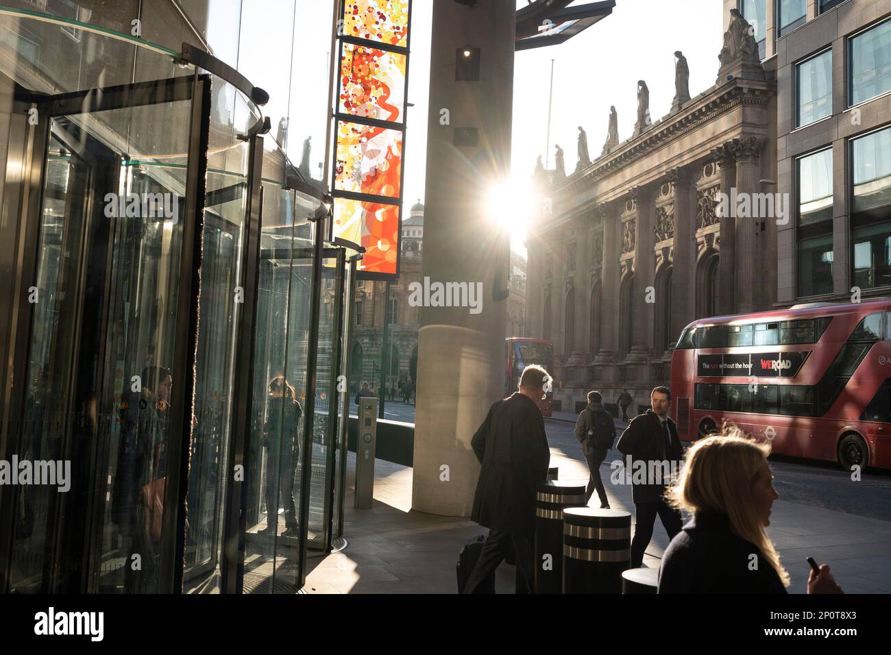 Afternoon sunlight on Bishopsgate and City workers in the City of London, the capital's financial district, on 2nd March 2023, in London, England. Stock Photo