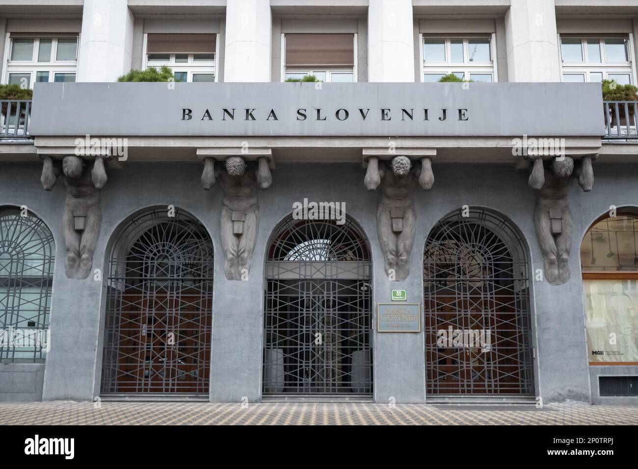 LJUBLJANA, SLOVENIA, 19 February 2023: Slovenian national bank - Banka Slovenije building with EU Flag Stock Photo