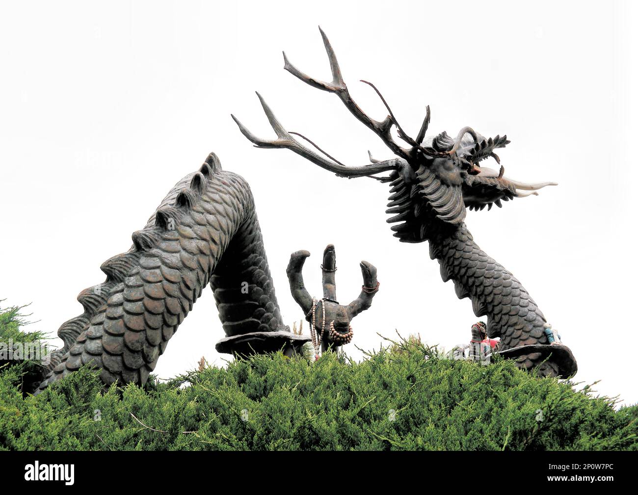 Busan, South Korea - May 2019: A bronze statue of a dragon at Haedong Yongungsa Temple Stock Photo