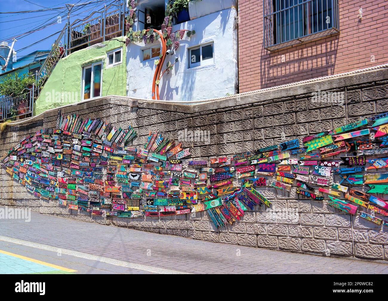 Busan, South Korea - May 2019: Famous busan gamcheon culture village colourful fish shaped mural art Stock Photo