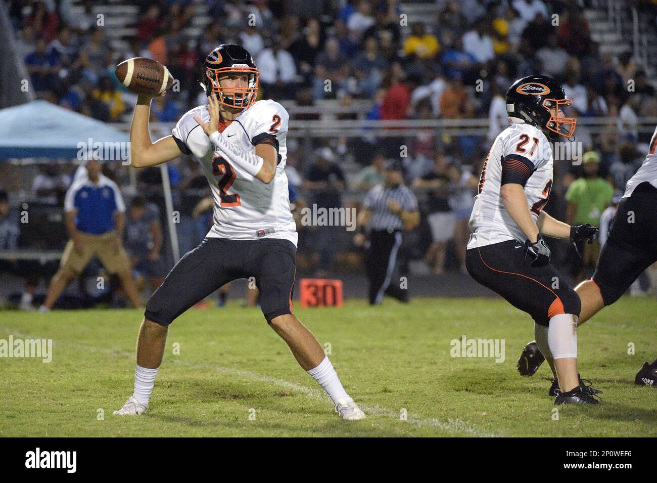 Oviedo quarterback Mitchell (2) throws a pass during a high