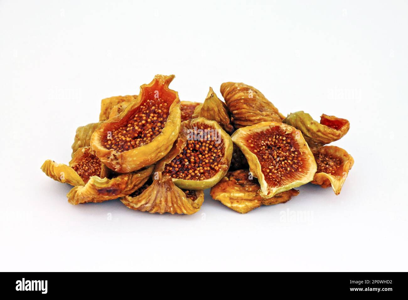 Cut dried figs on white background close-up. Stock Photo
