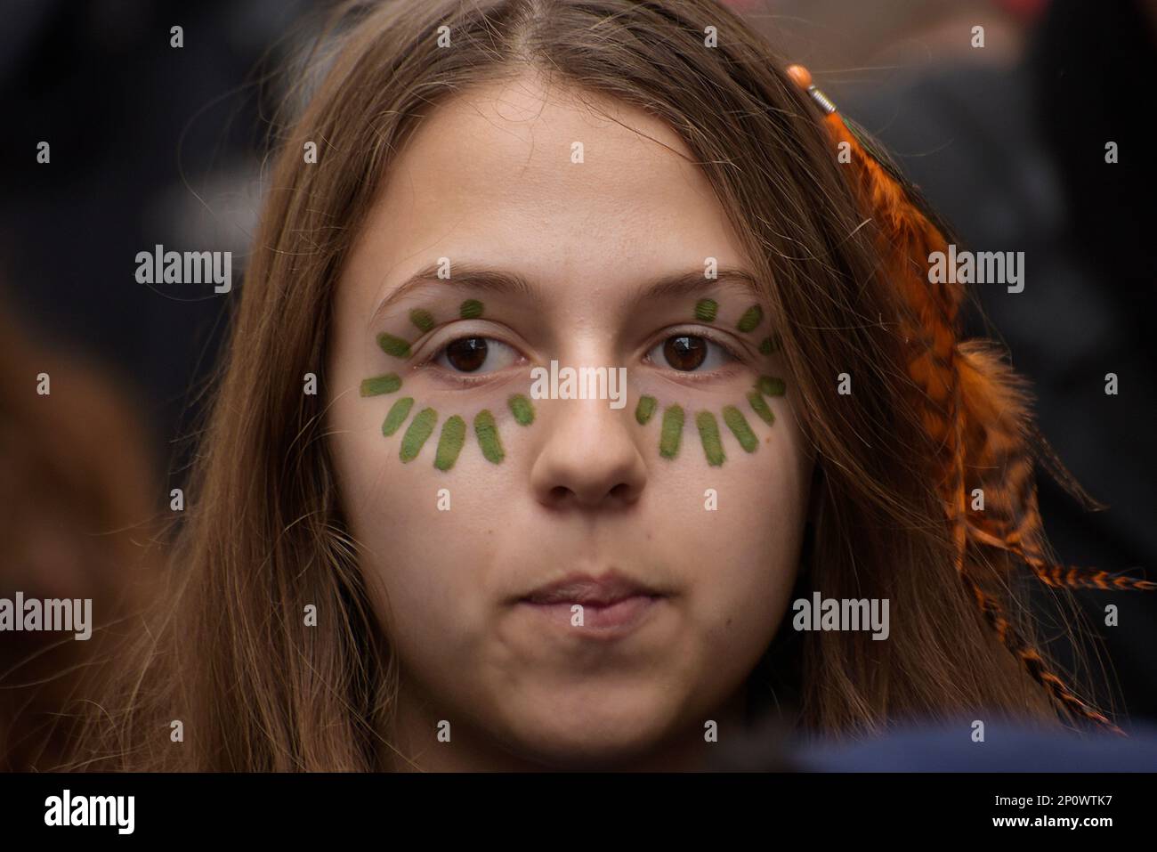 Rome, Italy. 03 march 2023. Close up of a protester with her face painted. Climate activists held a demonstration organized by Fridays For Future, as part of the Global Climate Strike calling for action against climate change. Stock Photo