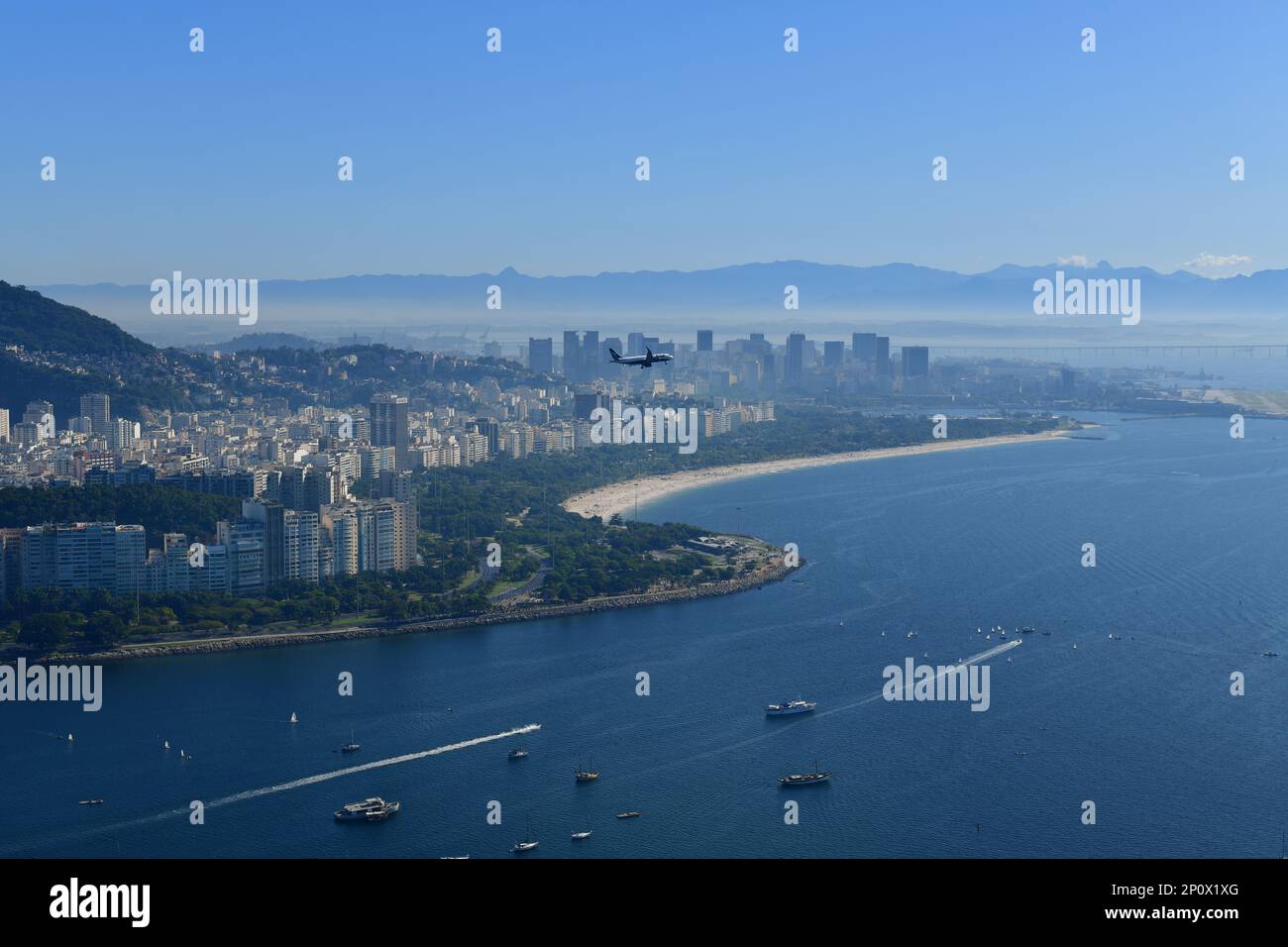 Airplane flying over the Guanabara Bay before landing. Rio de Janeiro, Brazil Stock Photo
